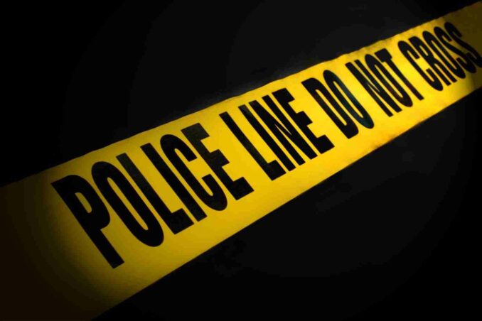 Police Line Tape On Black